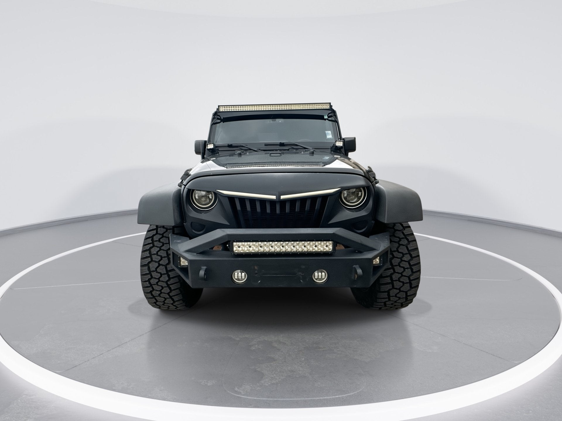 2016 Jeep Wrangler Unlimited — rear three-quarter view
