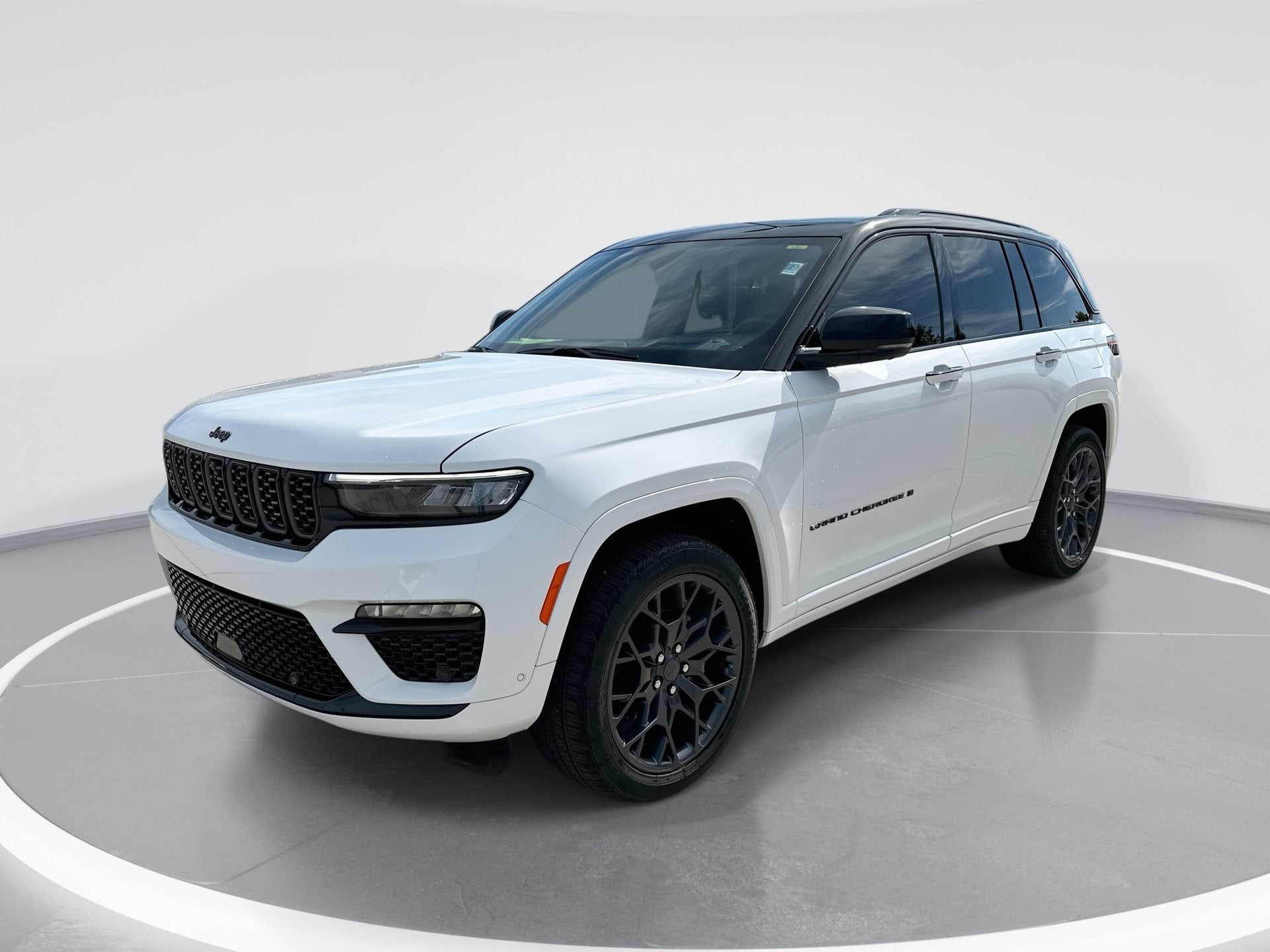 2025 Jeep Grand Cherokee Summit Reserve in Bright White Cl — front three-quarter view