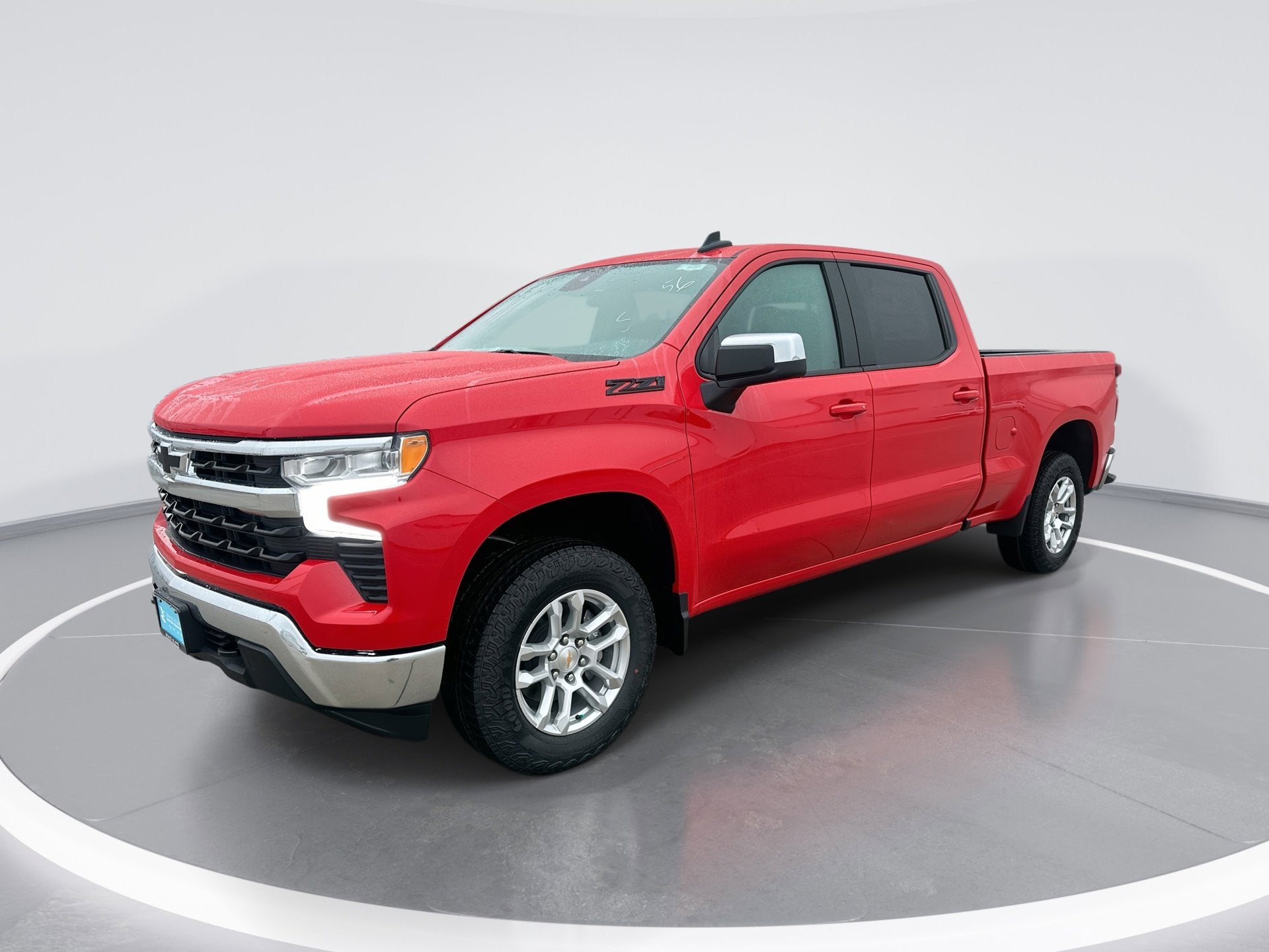 2026 Chevrolet Silverado 1500 LT in Red Hot — front three-quarter view