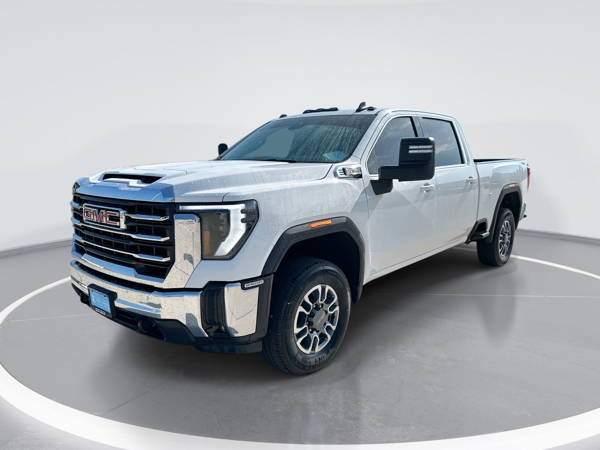 2025 GMC Sierra 2500 HD SLE in Summit White — front three-quarter view