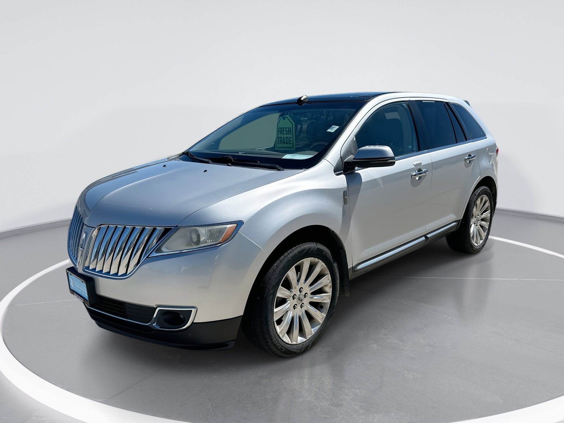 2012 Lincoln MKX AWD 4DR SUV in Ingot Silver Me — front three-quarter view