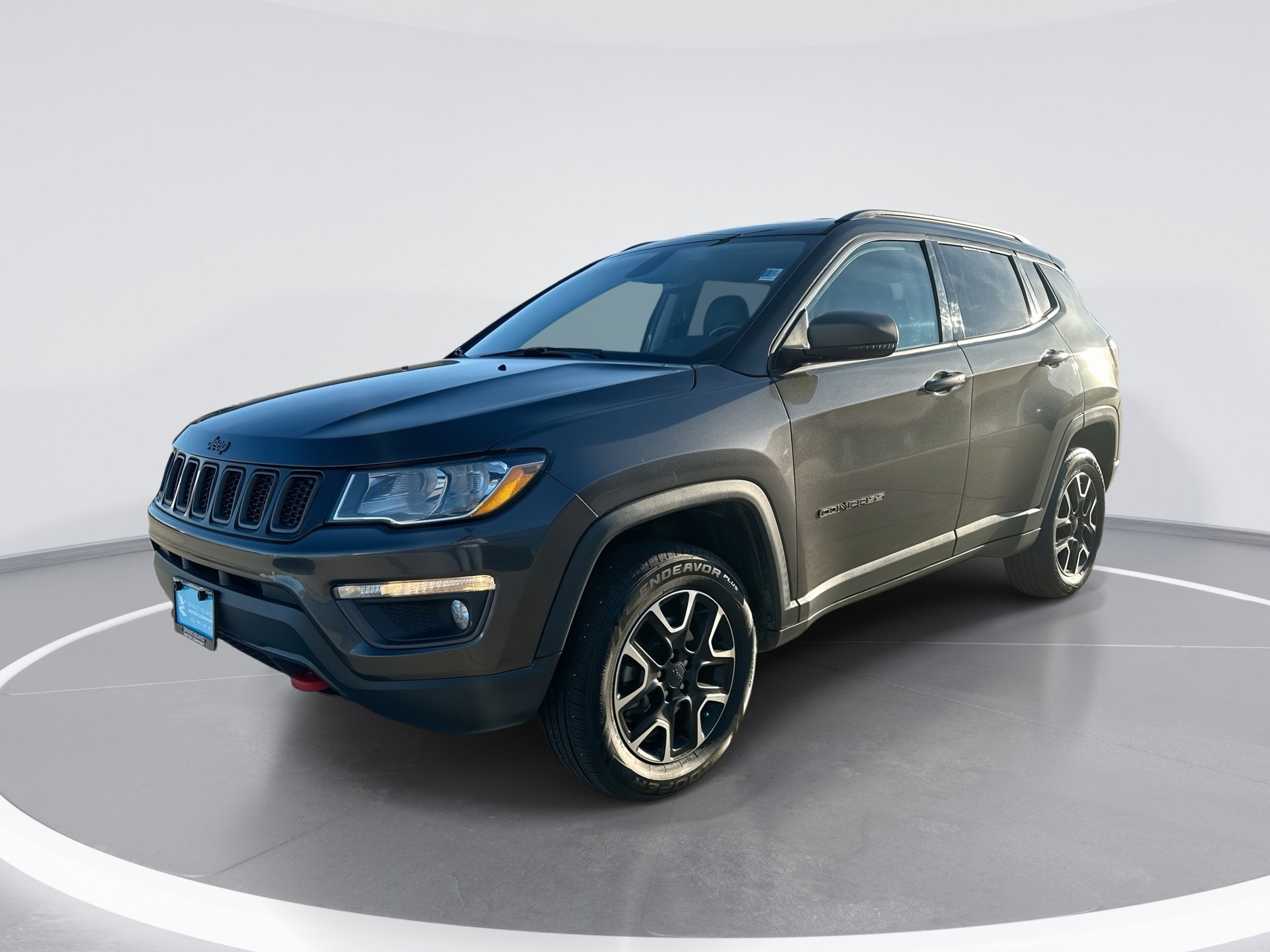2020 Jeep Compass Trailhawk in Granite Crystal — front three-quarter view