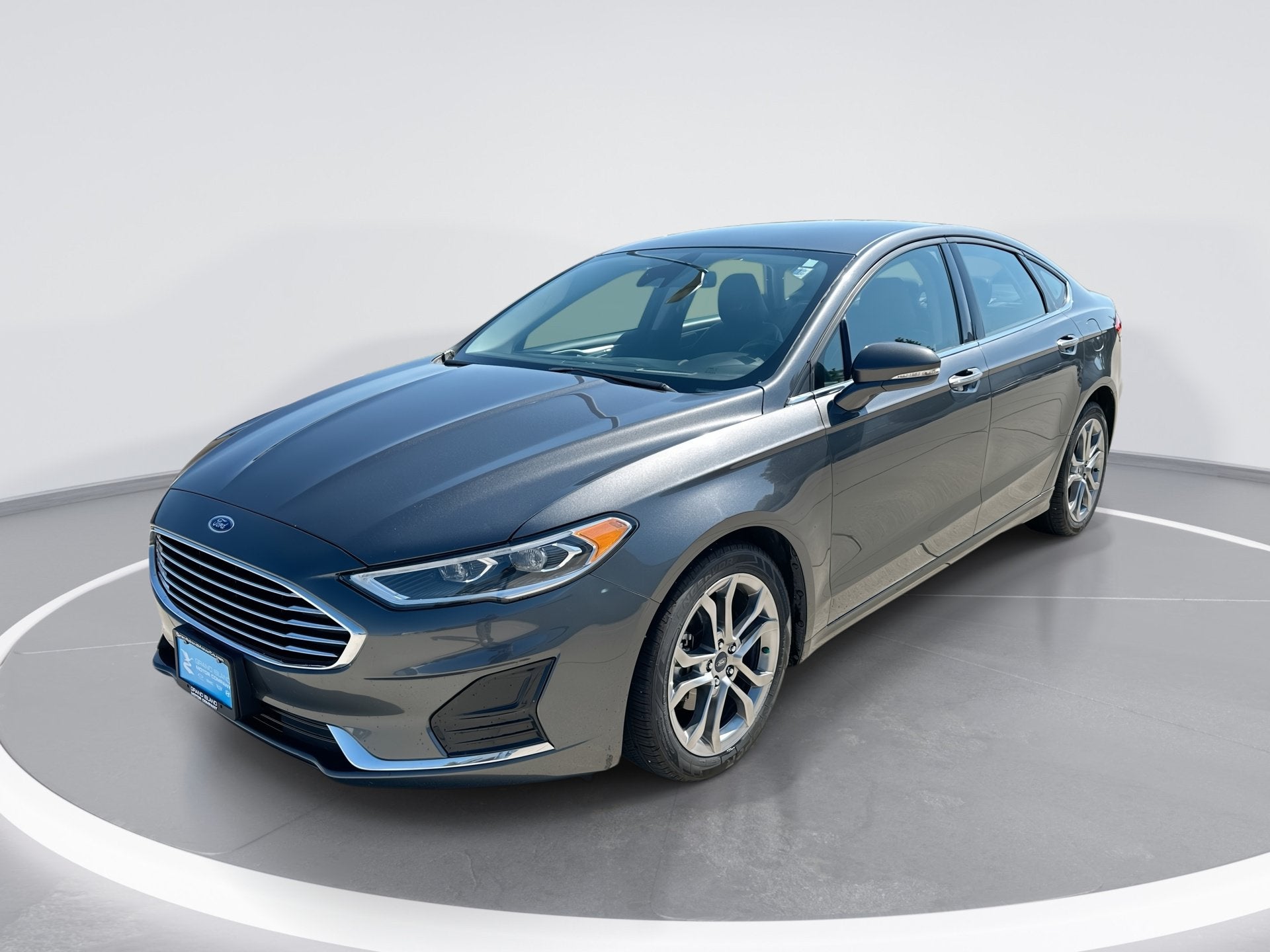 2020 Ford Fusion SEL in Black — front three-quarter view