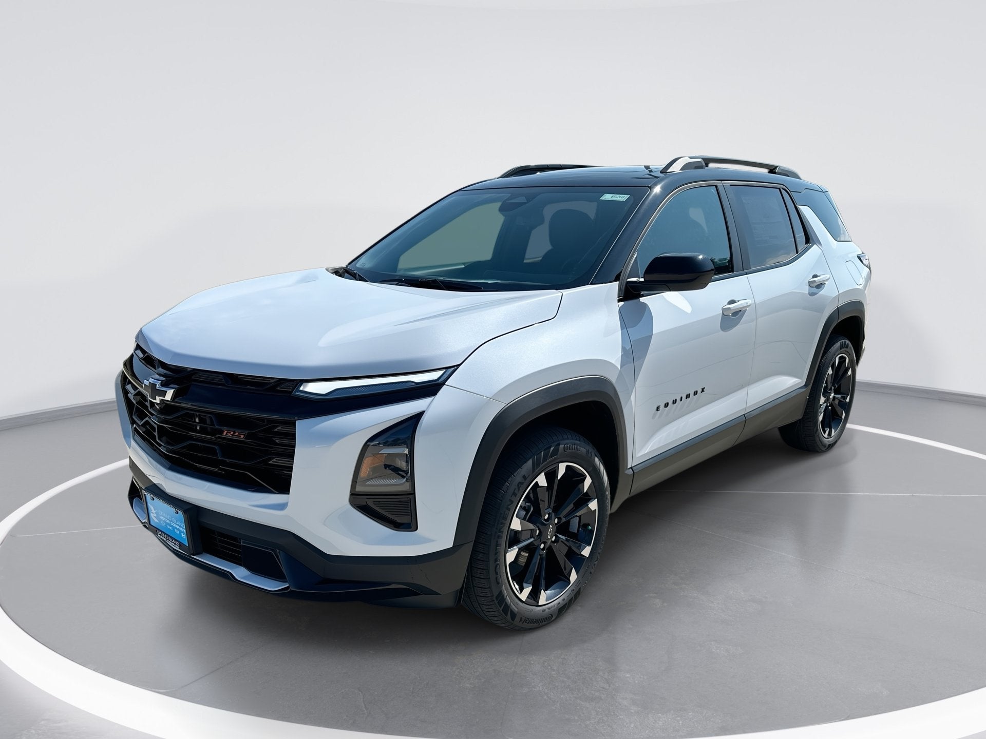 2026 Chevrolet Equinox RS in Polar White Tricoat — front three-quarter view