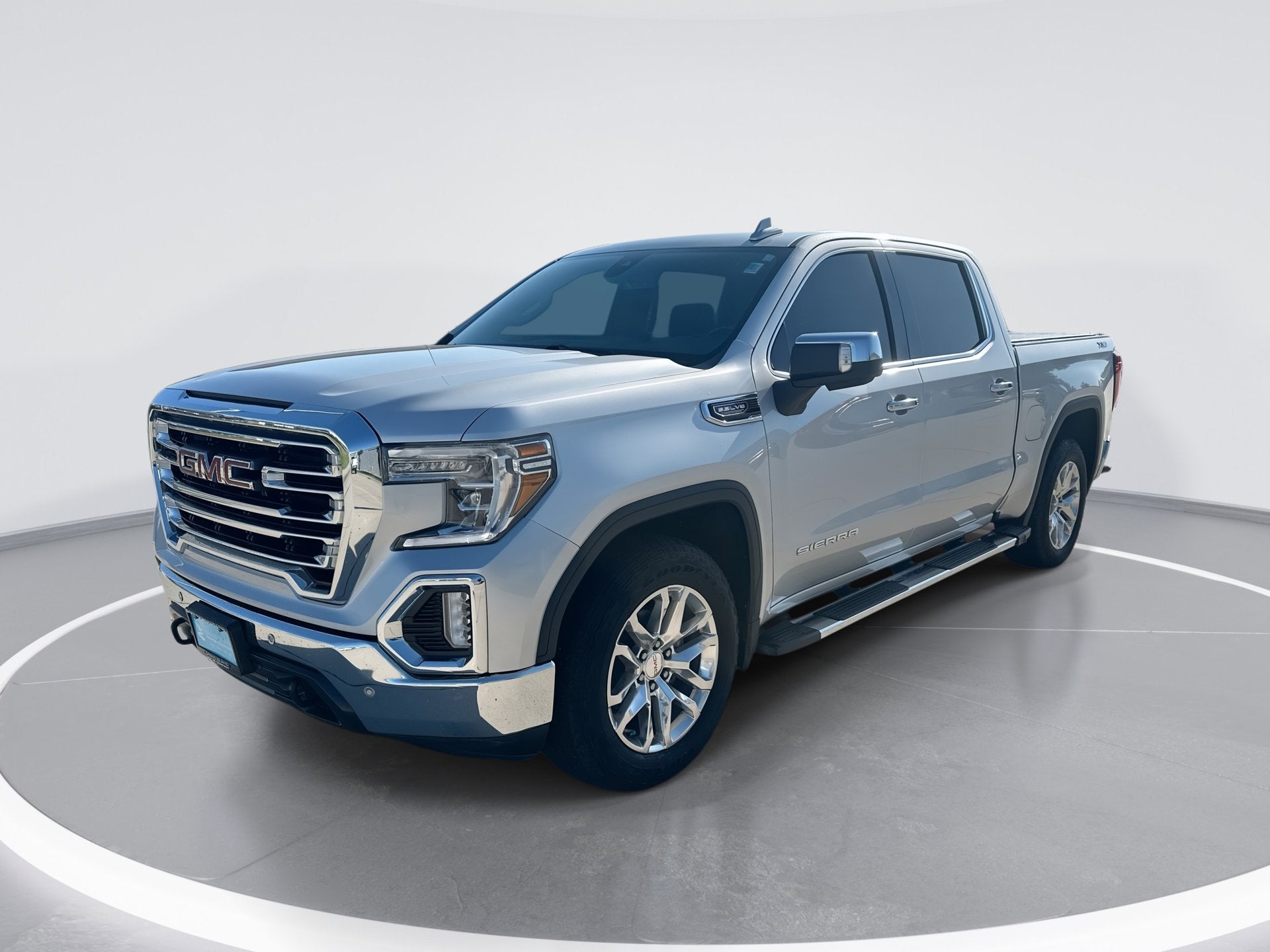2021 GMC Sierra 1500 SLT in Quicksilver Metallic — front three-quarter view