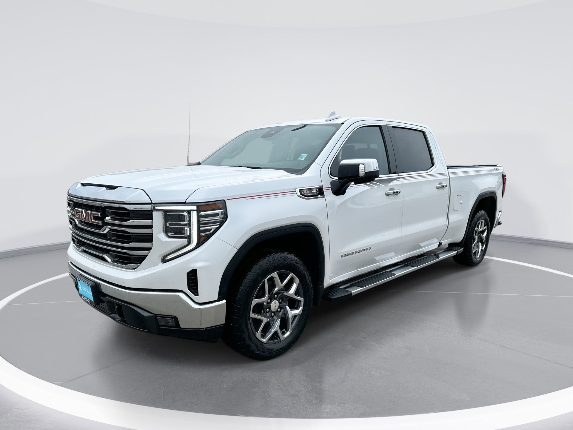 2023 GMC Sierra 1500 SLT in White Frost Tricoat — front three-quarter view