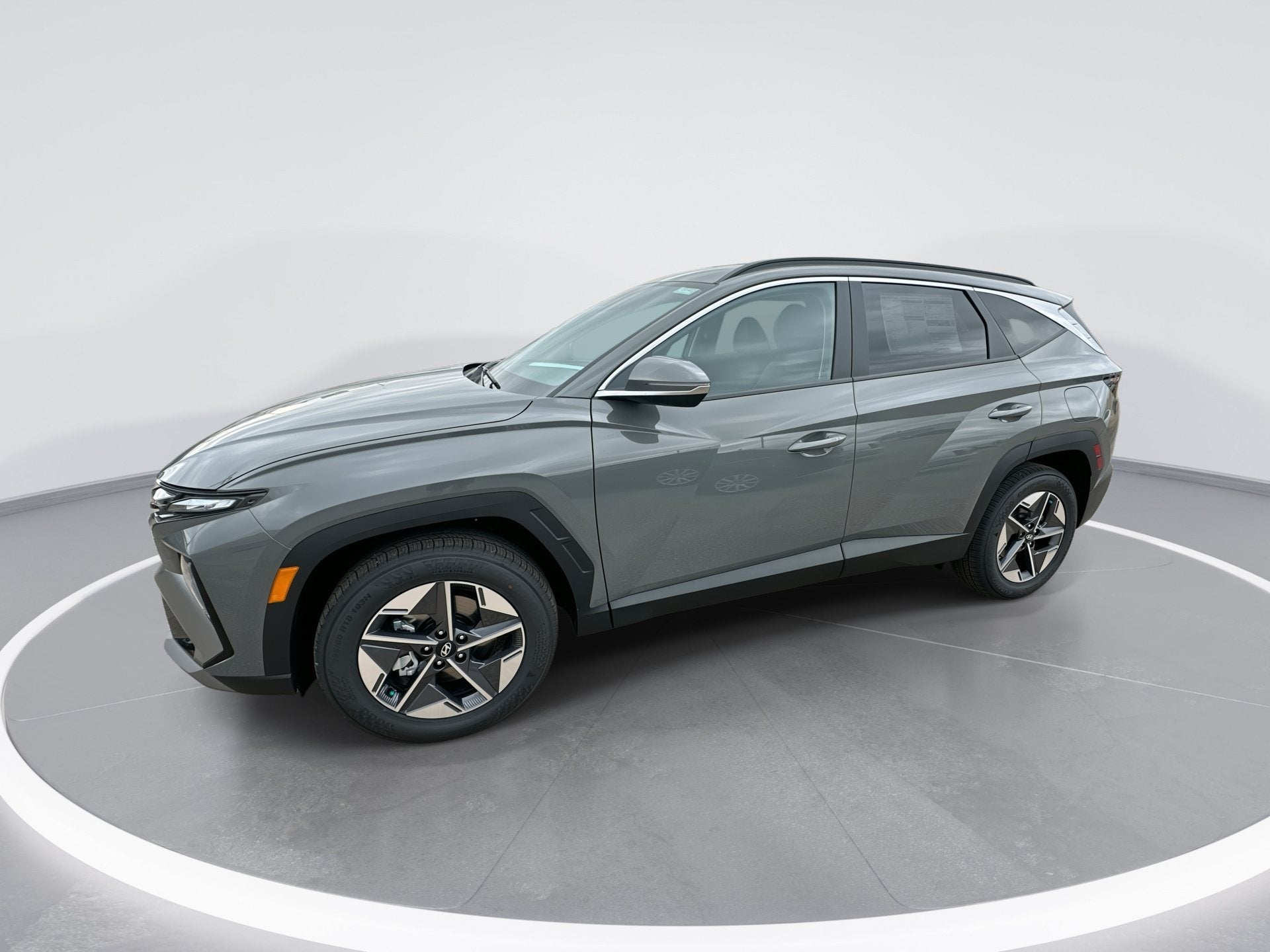 2026 Hyundai Tucson SEL Premium in Hampton Gray — front three-quarter view