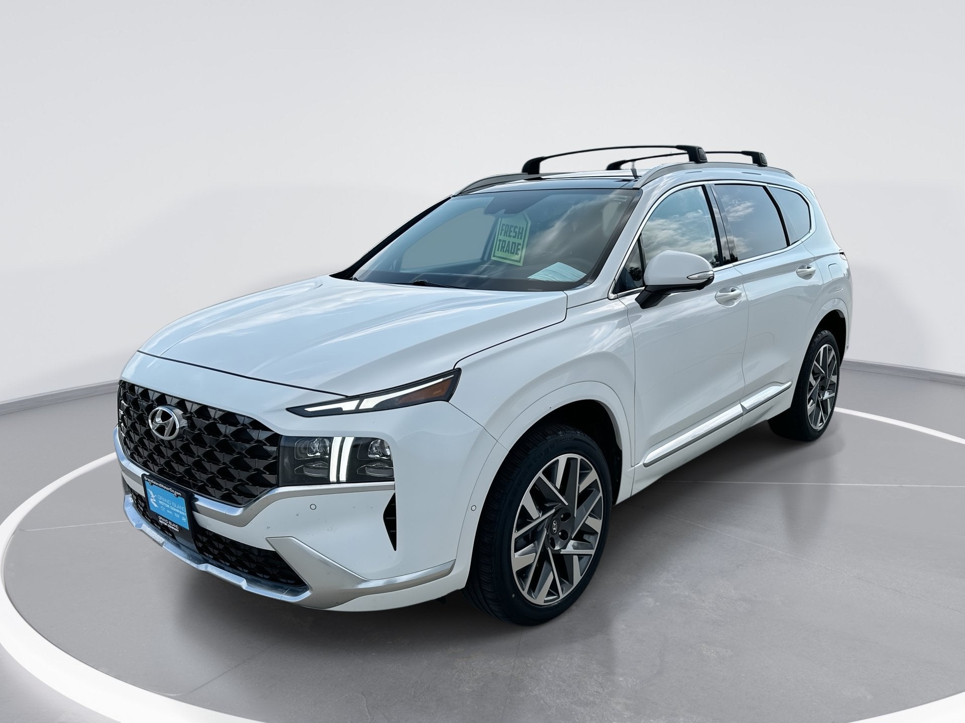 2021 Hyundai Santa Fe Calligraphy in Quartz White — front three-quarter view