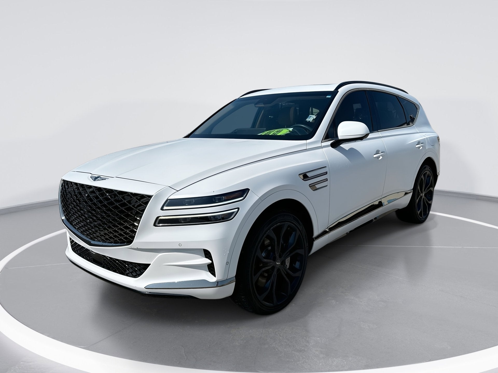 2024 Genesis GV80 Prestige Signature in Matterhorn Whit — front three-quarter view