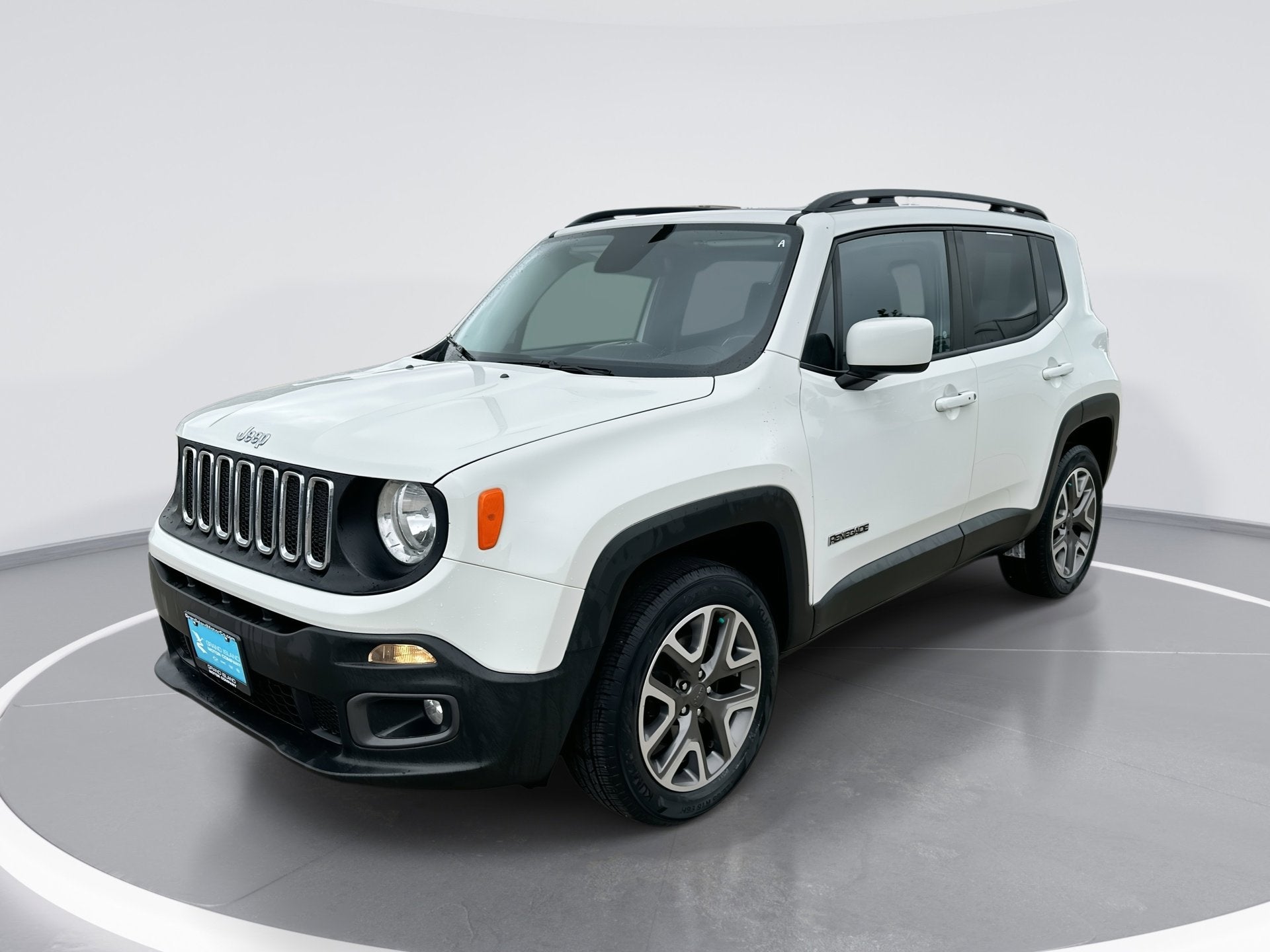 2017 Jeep Renegade Latitude in Alpine White — front three-quarter view